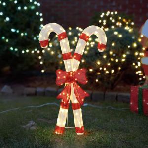 imageOutvita Lighted Candy Cane Christmas Decorations Outdoor 100 PreLit LED Warm White Candy Canes Lights for Christmas Yard Decor Light Up Xmas Lawn Ornaments with Metal Stakes for Outside Porch